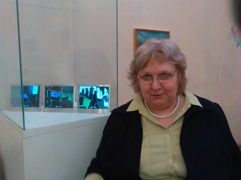 Natalia Druzhinkina beside an installation